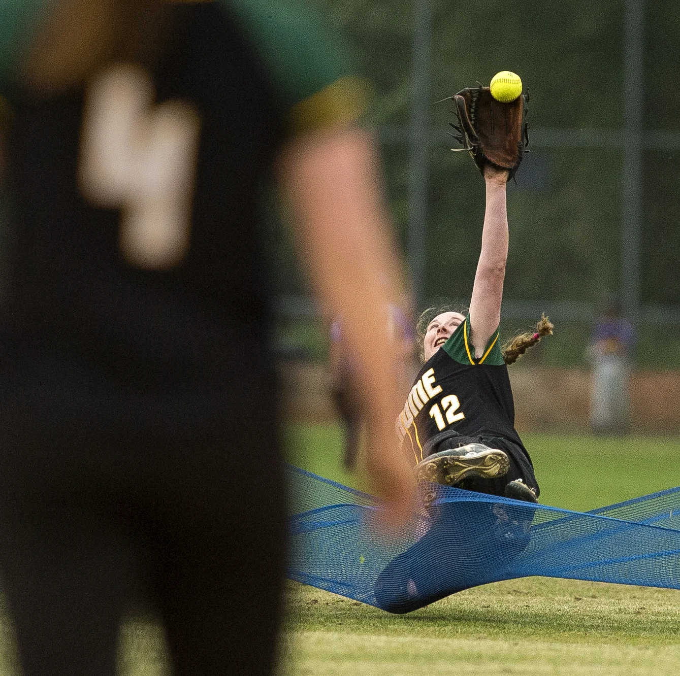  Sehome's Tori McDowell robs a three-run home run to win a game 12-11 against Granite Falls on day one of the 2016 Northwest District 1 2A Softball Tournament on Wednesday, May 18, in Sedro-Woolley, Washington.&nbsp; 