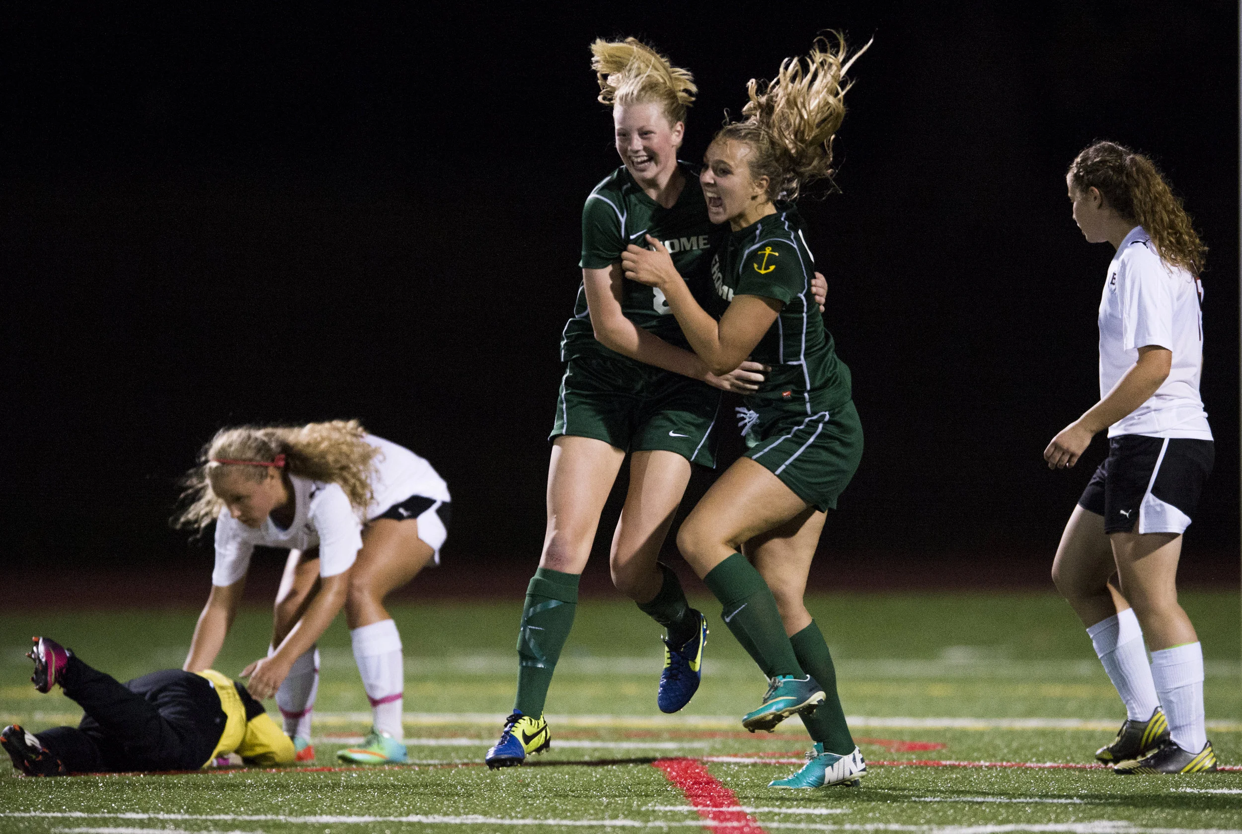  Sehome's Christina Funk, right, celebrates with teammate Fiona Dawson after scoring a goal against Bellingham in the second half at Civic Stadium on Tuesday, Sept. 9, 2014 in Bellingham, Wash.&nbsp; 