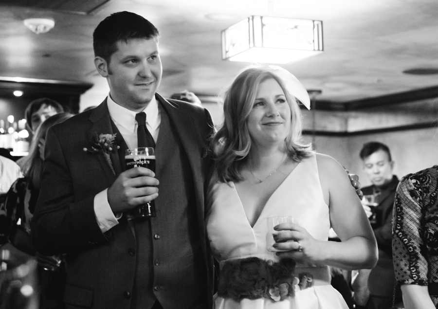 The bride and groom listening to the toast...
