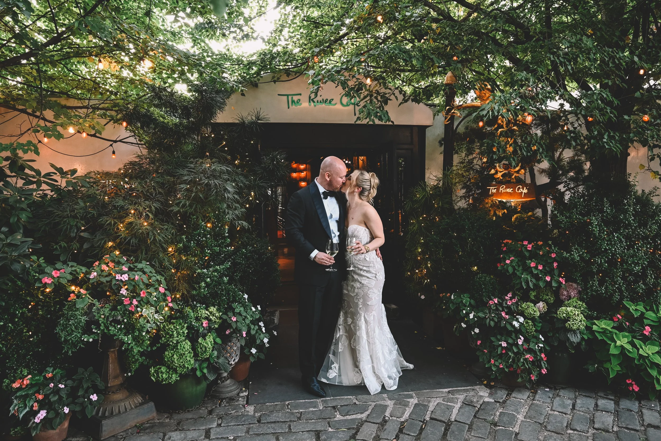 NYC wedding photographer capturing bride and groom at The River Café Brooklyn with getting ready at Casa Cipriani Hotel, documenting romantic luxury waterfront wedding.
