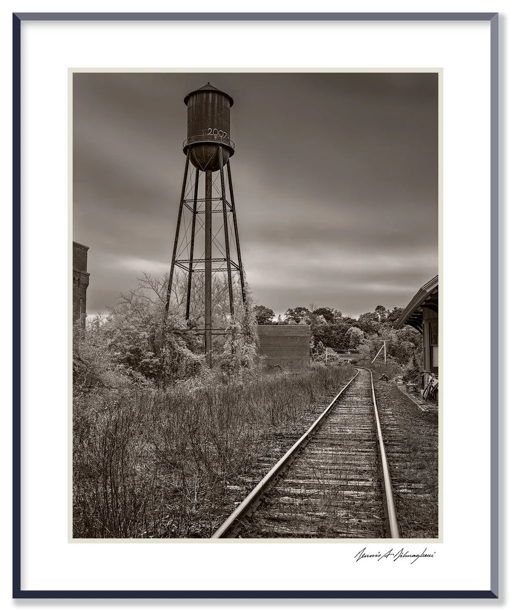 Water Tower - Housatonic, Massachusetts, ca 2015 Housatonic dates back to the 1800s and was formed around textile and paper mills. At its peak, Monument Mills, a textile manufacturer, occupied five factory buildings and employed 500. The mill closed in 1956.