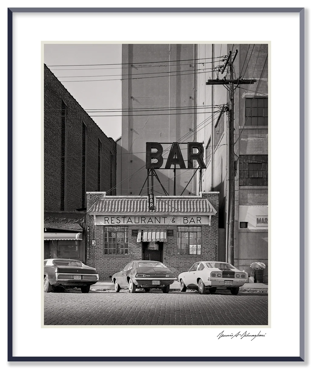 Downtown Restaurant & Bar - New York, New York A popular after work hangout for construction workers in the downtown area. Signs in window - "Rheingold Beer", "Schaefer Beer", "Topless Dancer".