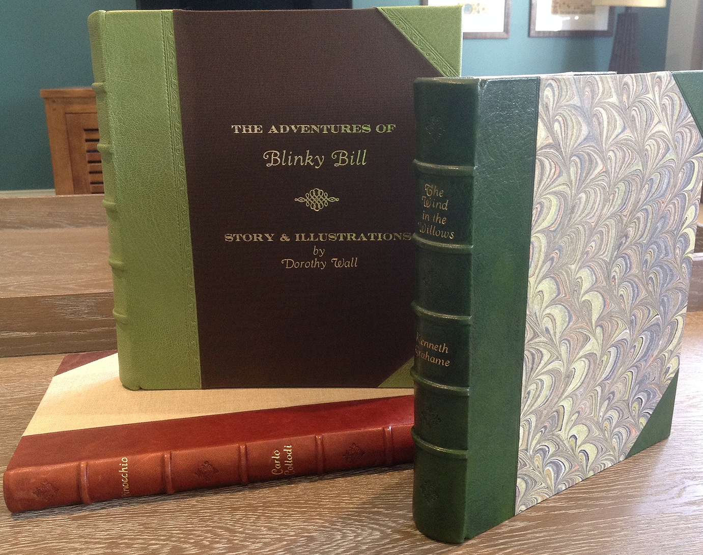 Half leather bindings of Pinocchio, Blinky Bill and The Wind in the Willows