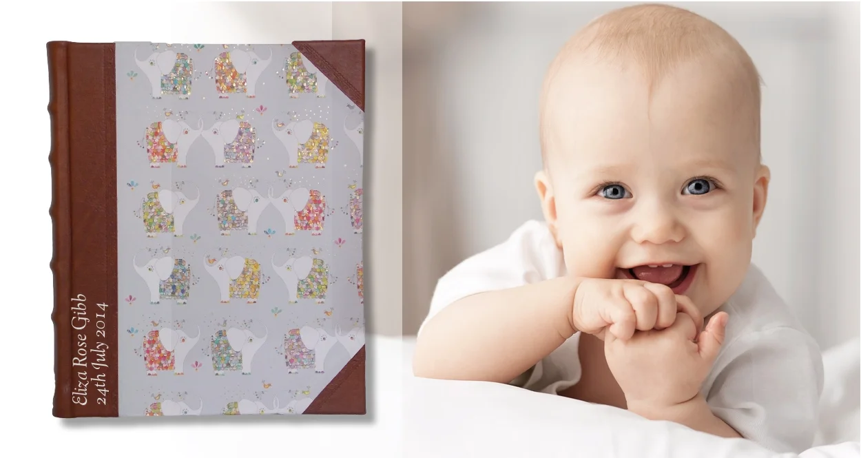 Product Featured: Baby Elephant Leather Portrait Album - Personalised with silver stamping in Goudy Cursive font