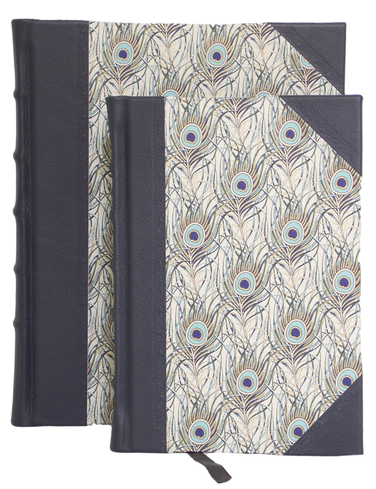 HALF LEATHER JOURNAL IN PEACOCK DESIGN   Fine leather corners and spine with classic raised bands and hand tooling  Italian gold foiled peacock feather design sides.  Cream textured pages with a marker ribbon  Product dimensions: small (22cm x 14cm - 84 leaves), &nbsp;large (26cm x 20cm - 100 leaves)