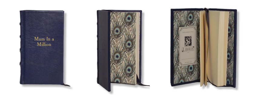 Product Featured: Slimline Leather Journal in Navy $75. God Embossing of title in Cheltenham Old Style font (embossing $25)