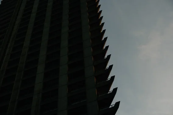 A high tower in silhouette.