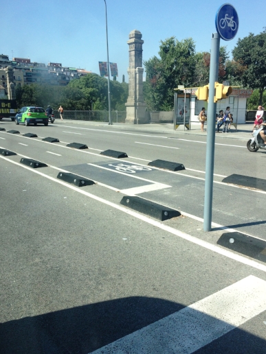 Here is another bike lane I spotted. Notice how the blocks protect the cyclists from the cars.