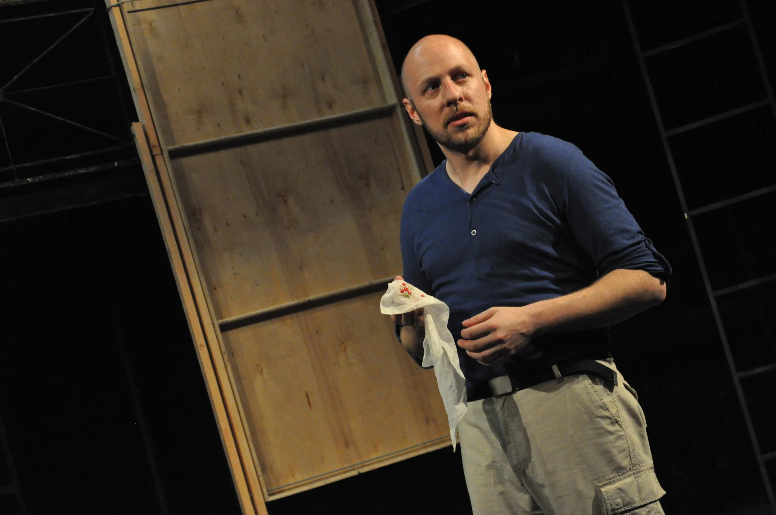 Iago with Desdemona's handkerchief ready to put the plot in motion. 