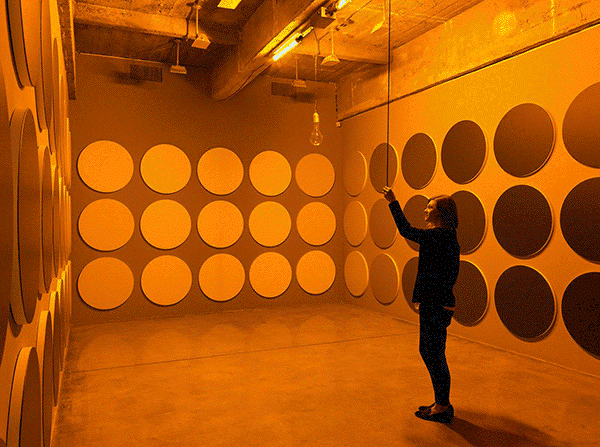 By artist Olafur Eliasson. Watch not the room change color but your eyes trying to interpret what's the real color.