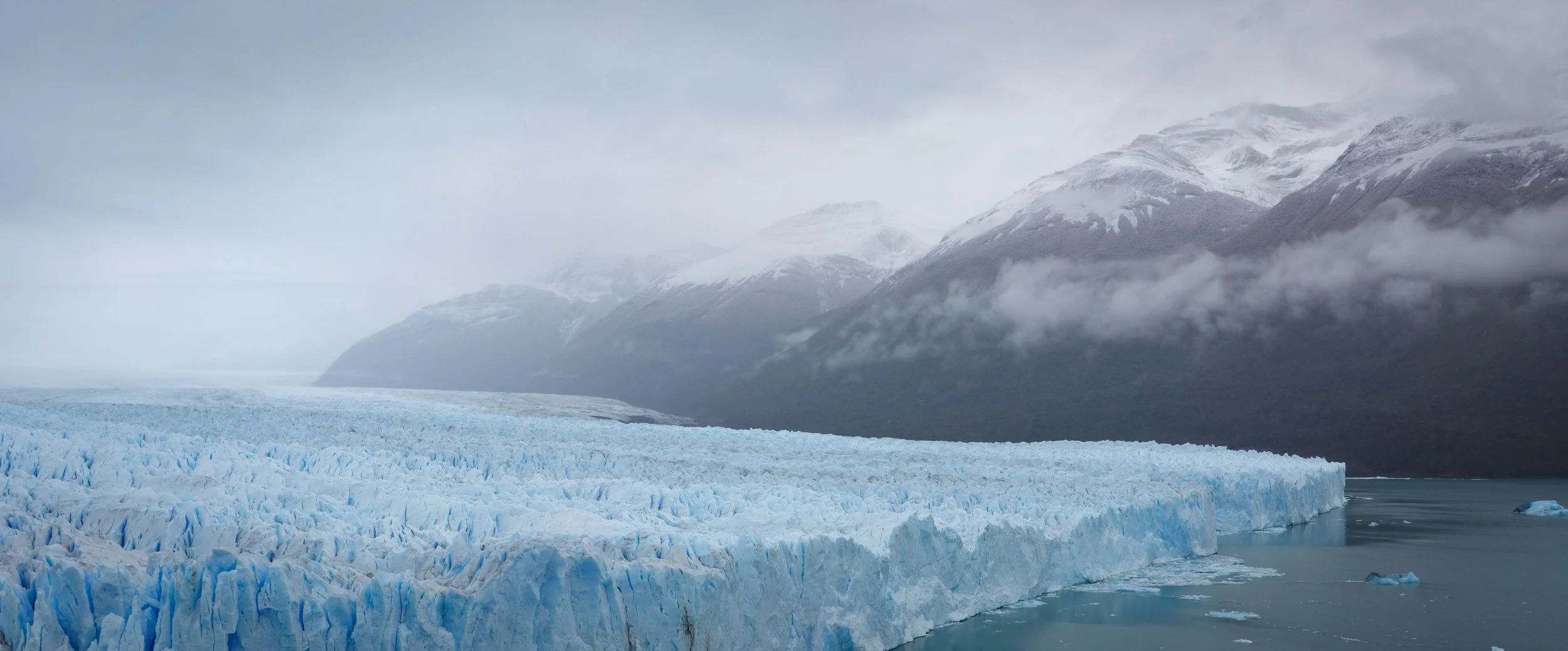 Clouds surrounding the terminus of the glacier