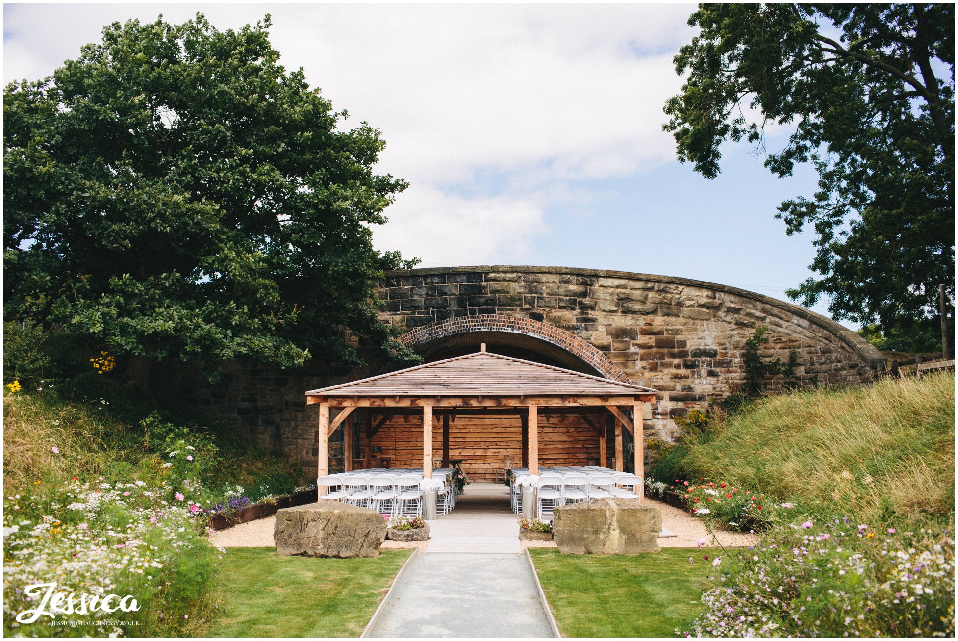 the outdoor ceremony set-up at tower hill barns in north wales