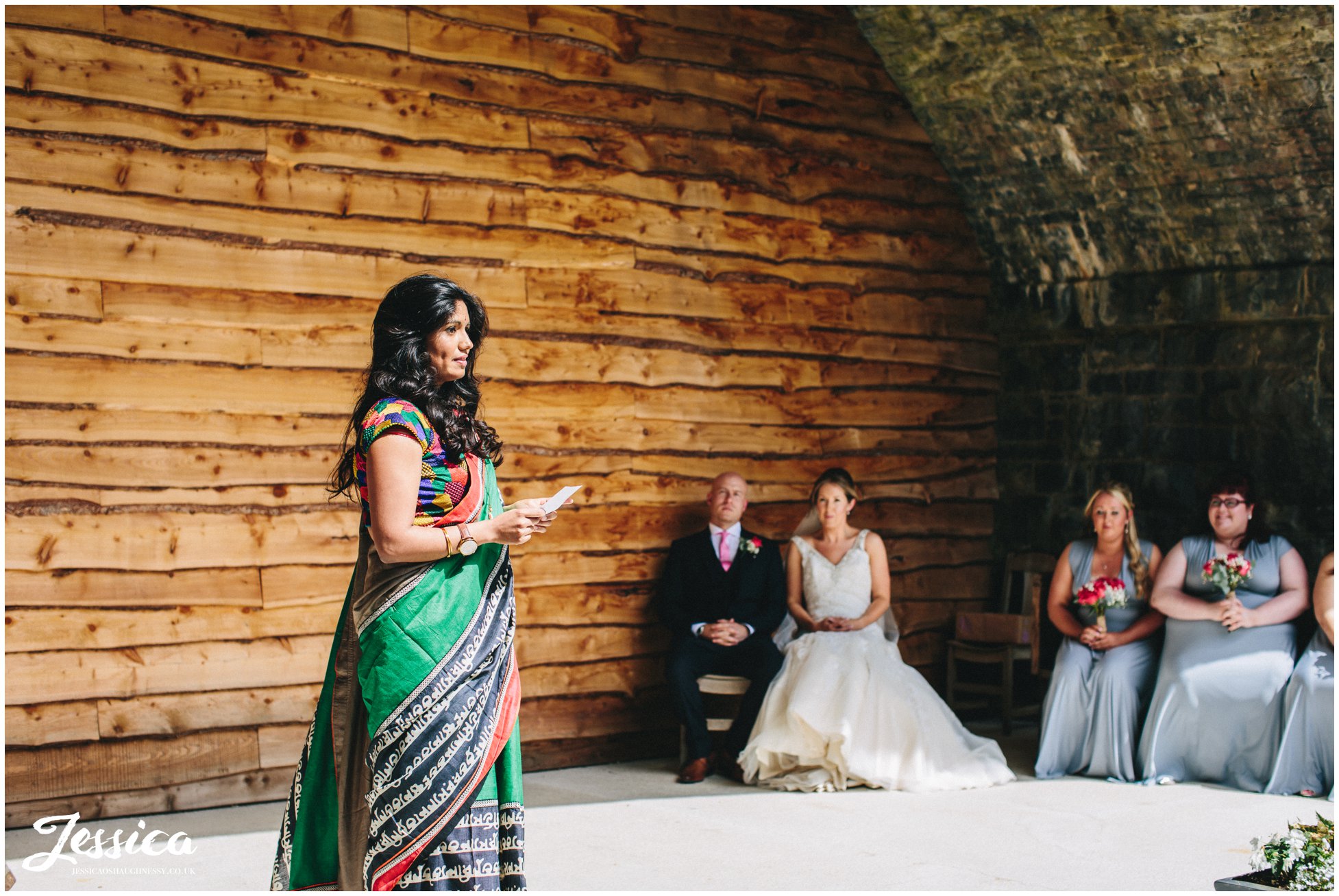 guest delivers a speech during the wedding ceremony - north wales wedding