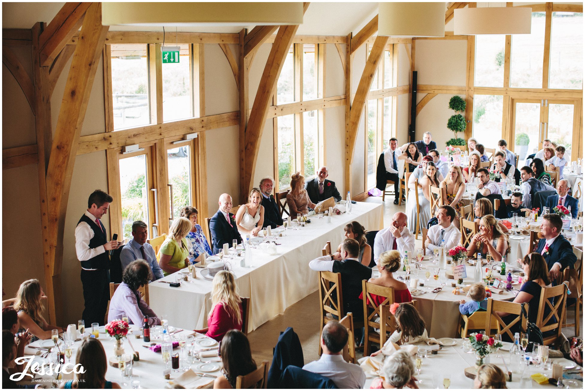  aerial view of best man giving his speech in the barn - north wales wedding photographer