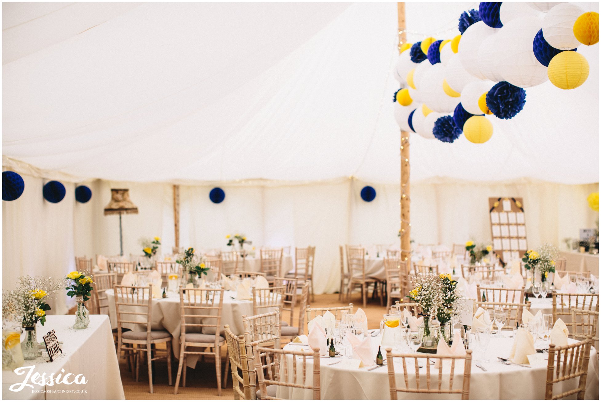 wedding breakfast marquee decorated ready for guests at a trafford hall wedding in chester