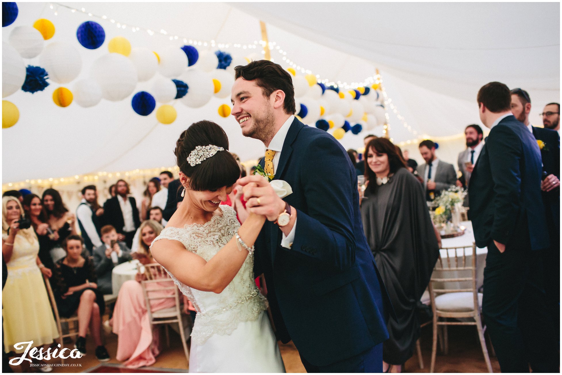 bride & groom share first dance in the marquee at trafford hall, chester