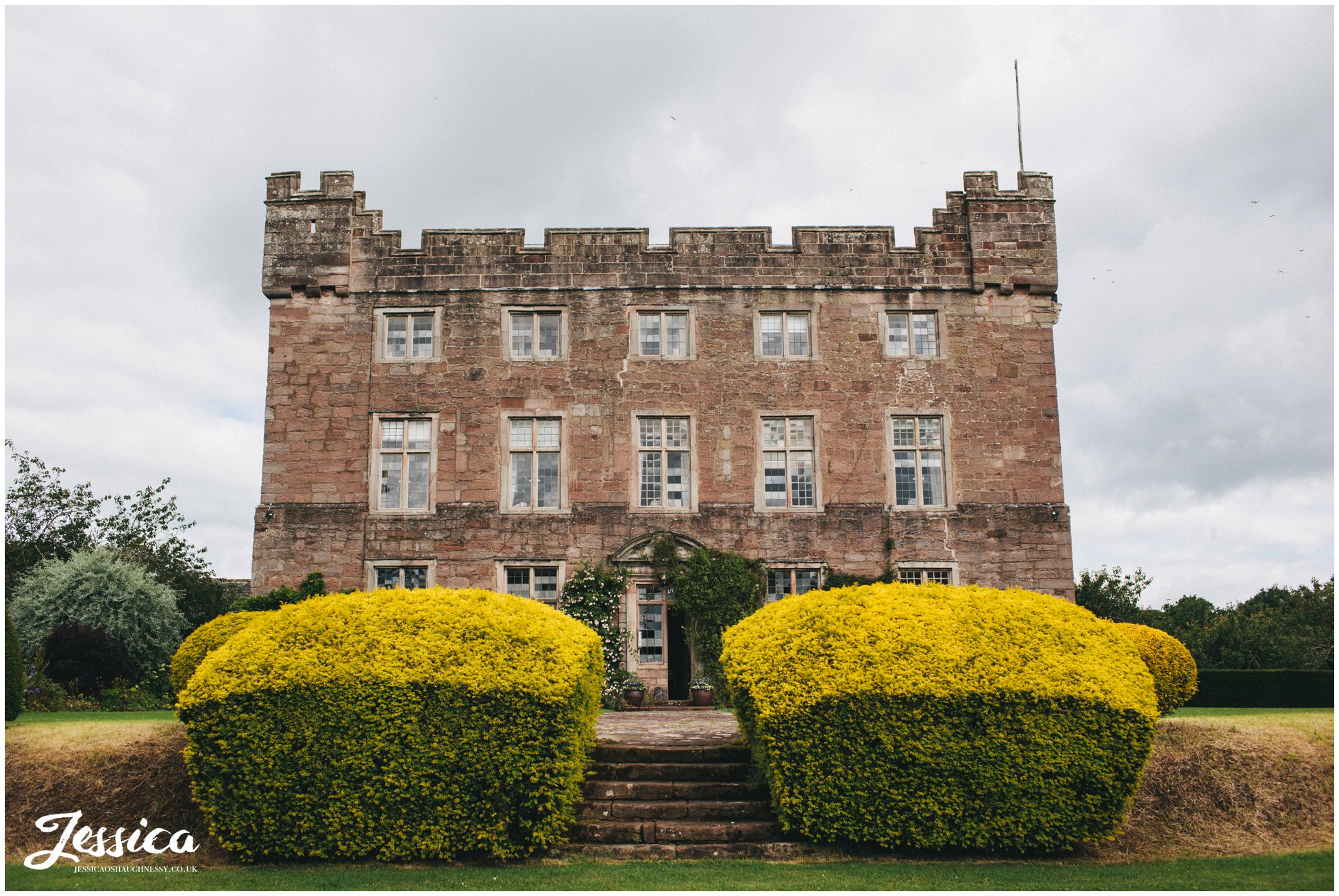 Shot of Askham Hall taken from the front lawn - lake district wedding photographer