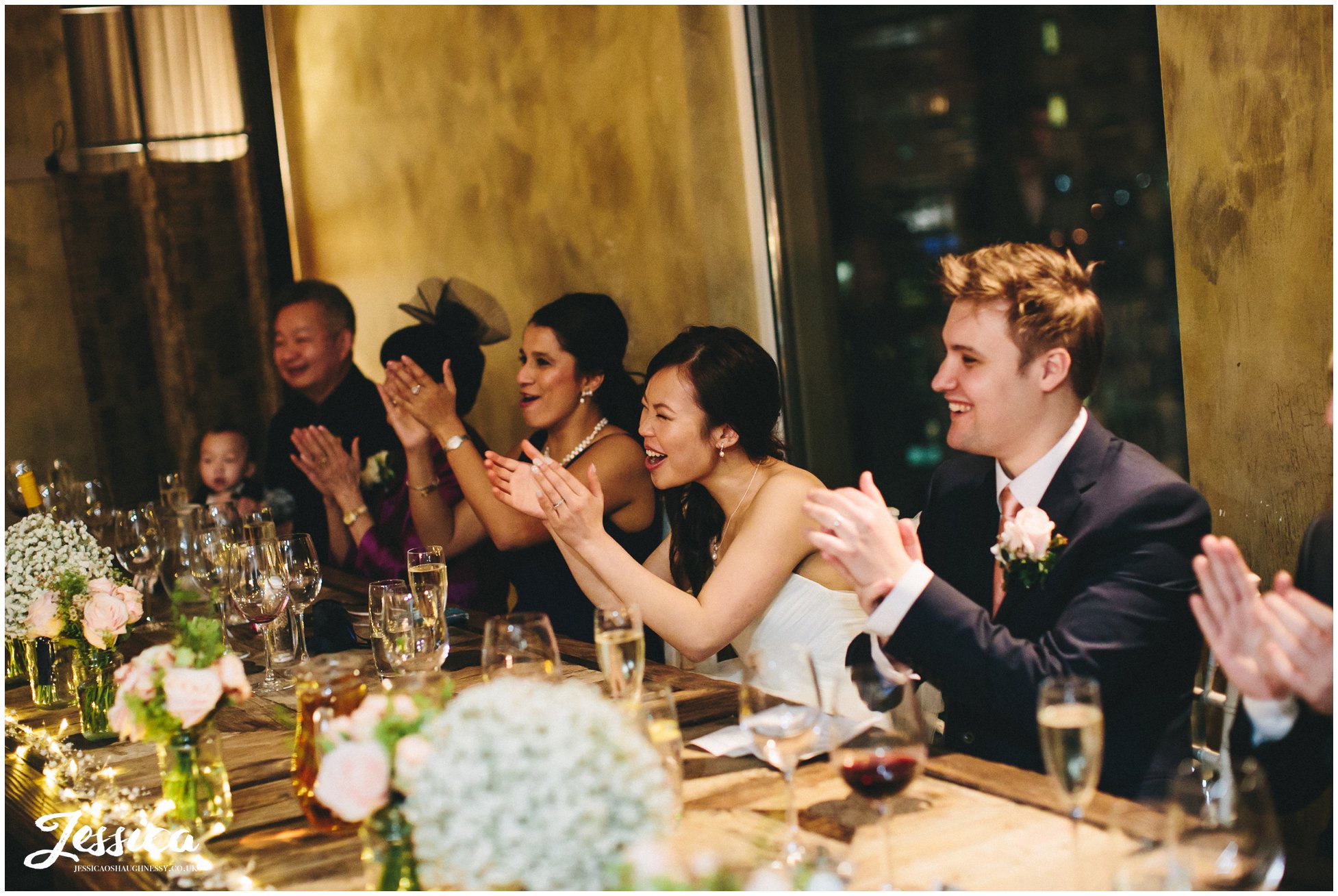 top table clapping after the speeches at on the 7th - media city
