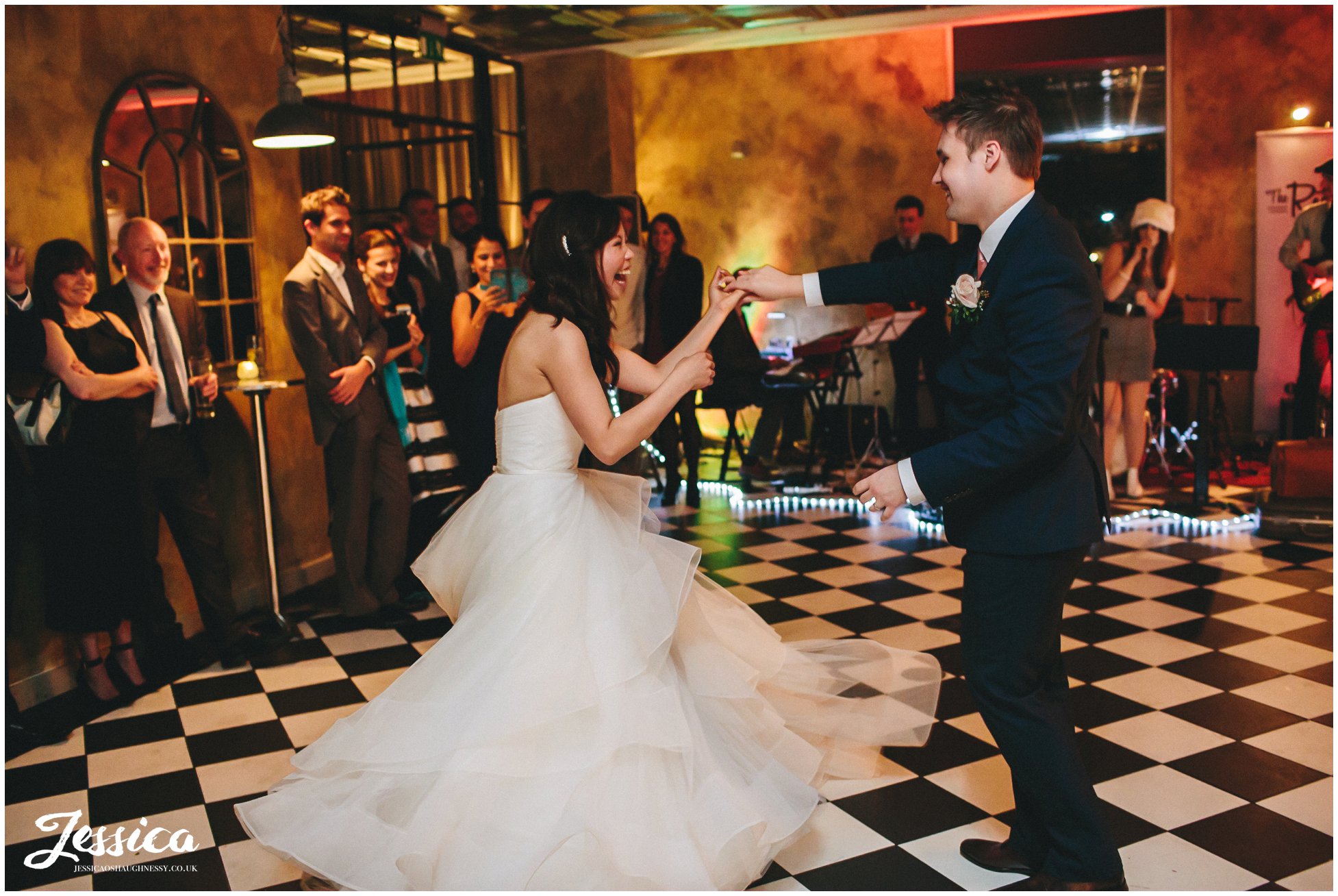 newly wed's dancing during their wedding reception in manchester