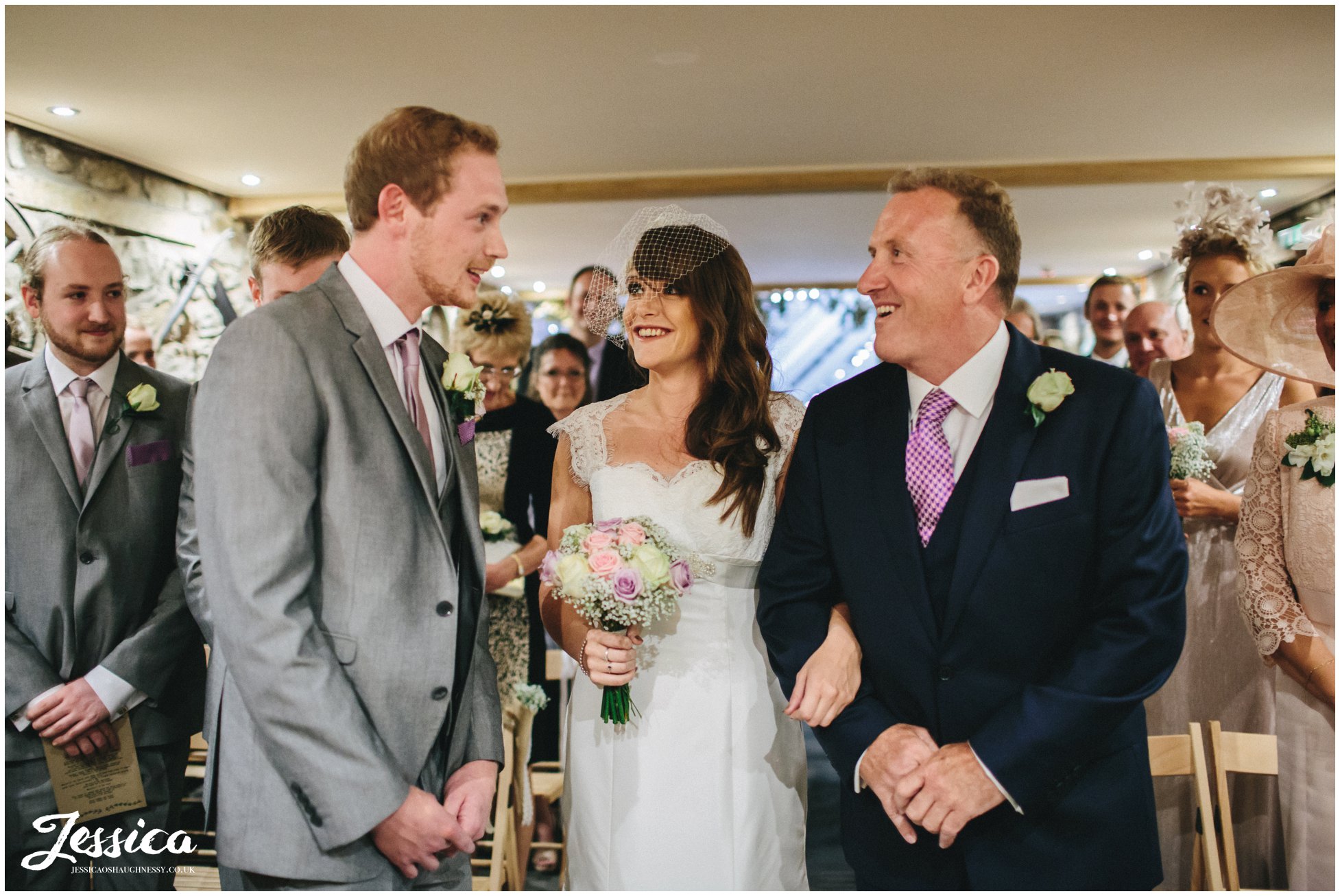bride see's her groom for the first time at their ceremony at tower hill barns - north wales wedding photographer