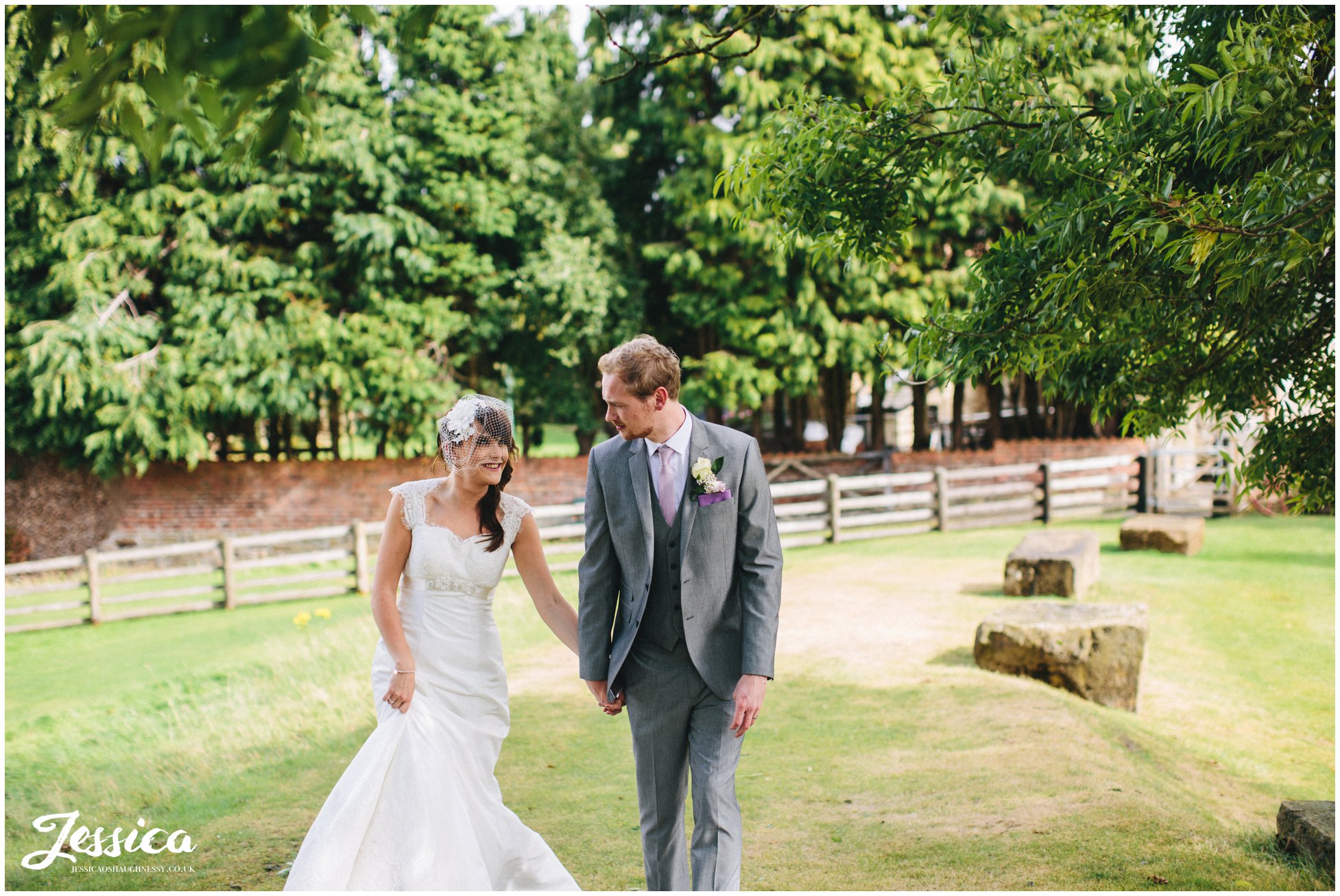 north wales wedding - newly wed's walk hand in hand 