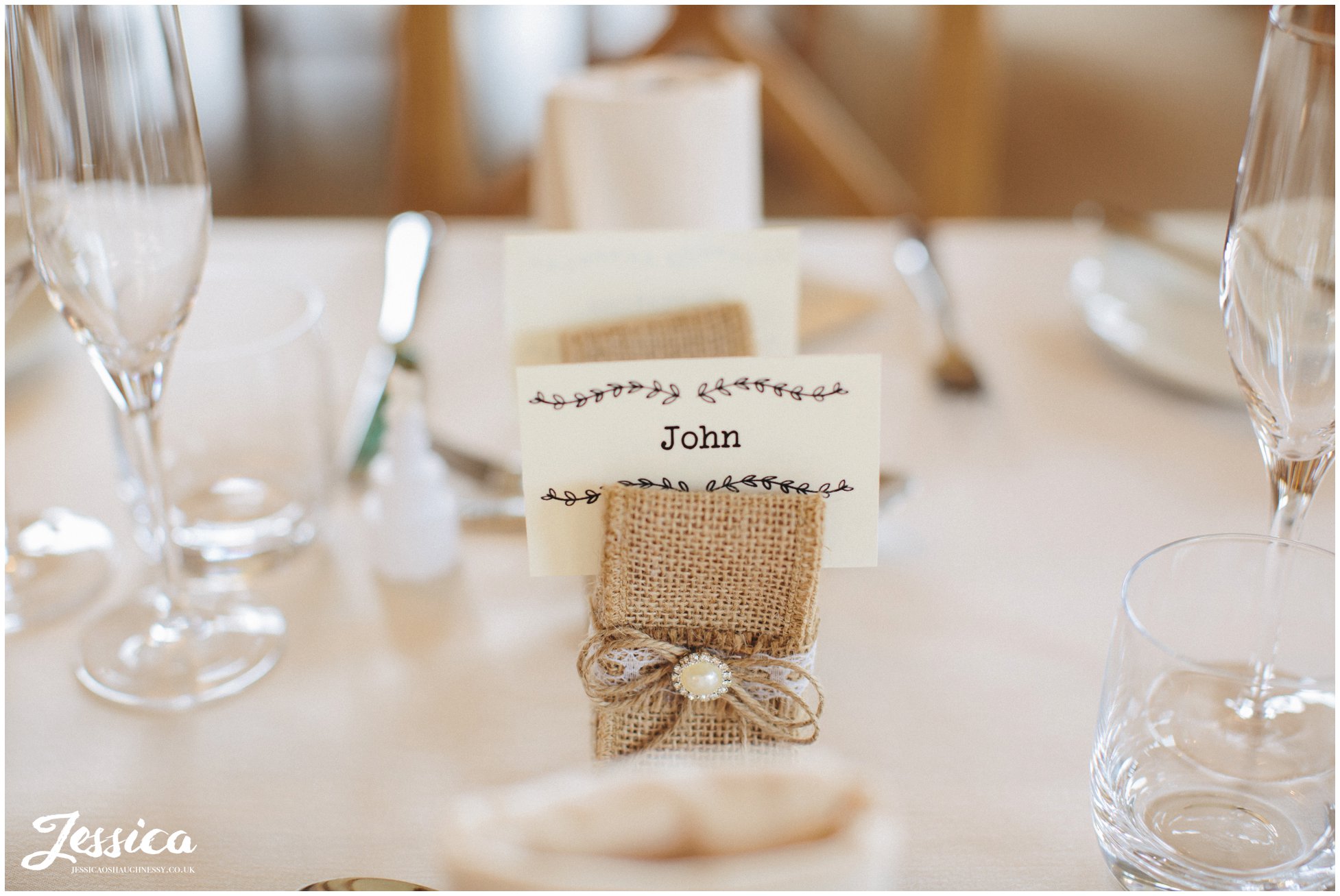 detail shot of place names that decorate the tables at tower hill barns