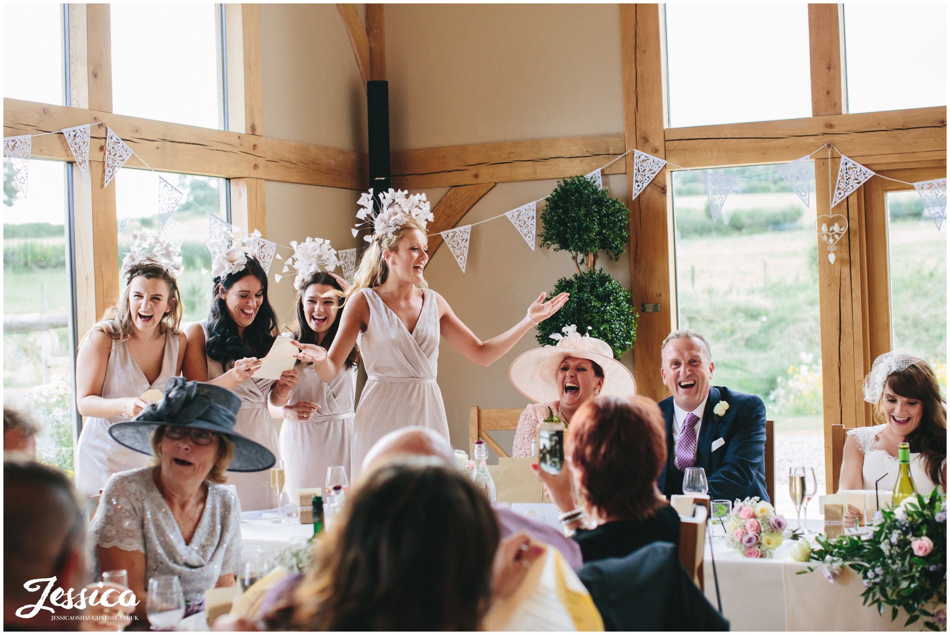 bridesmaids sing to the bride & groom on their wedding day