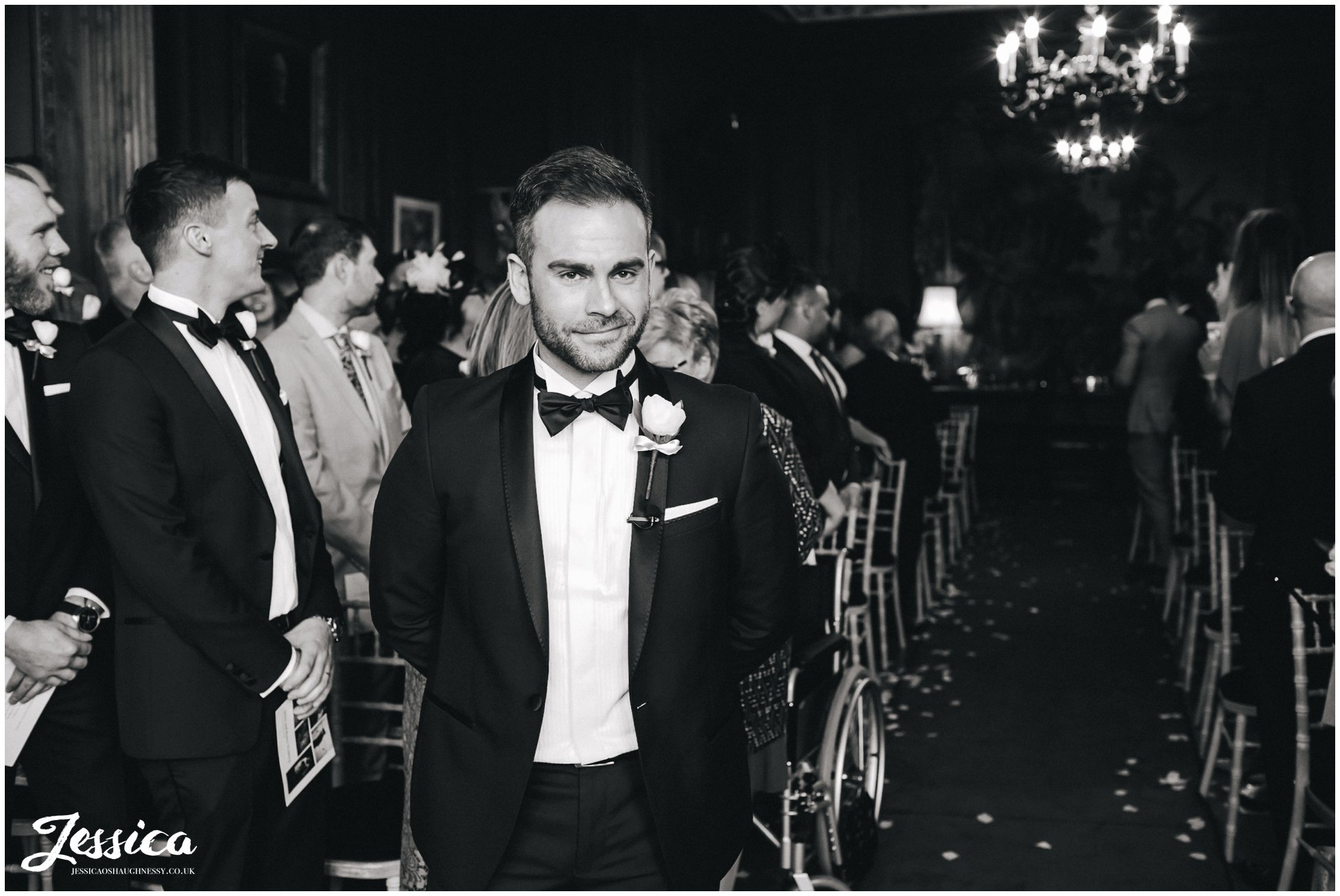 groom awaits his bride in thornton manor