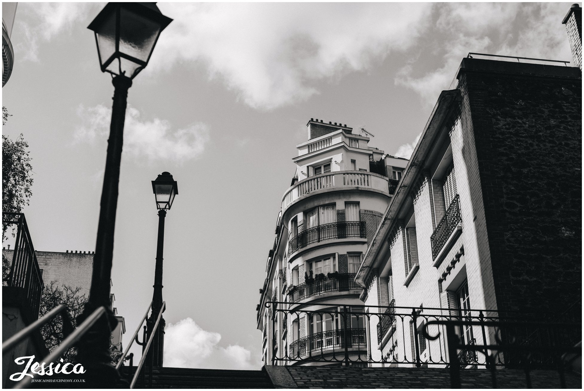 black and white photograph of parisian buildings