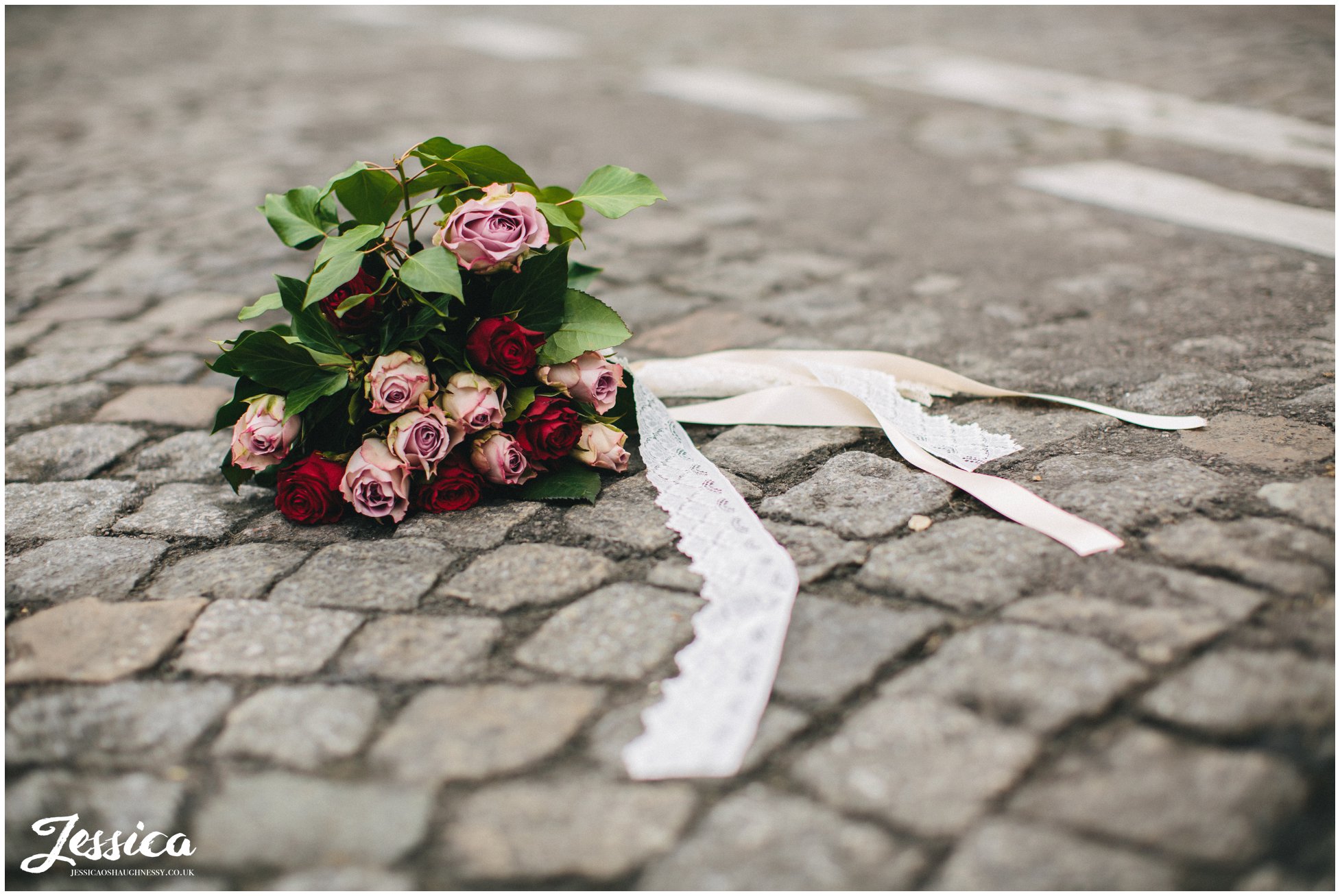 bridal bouquet lying on the a road in mont marte, paris