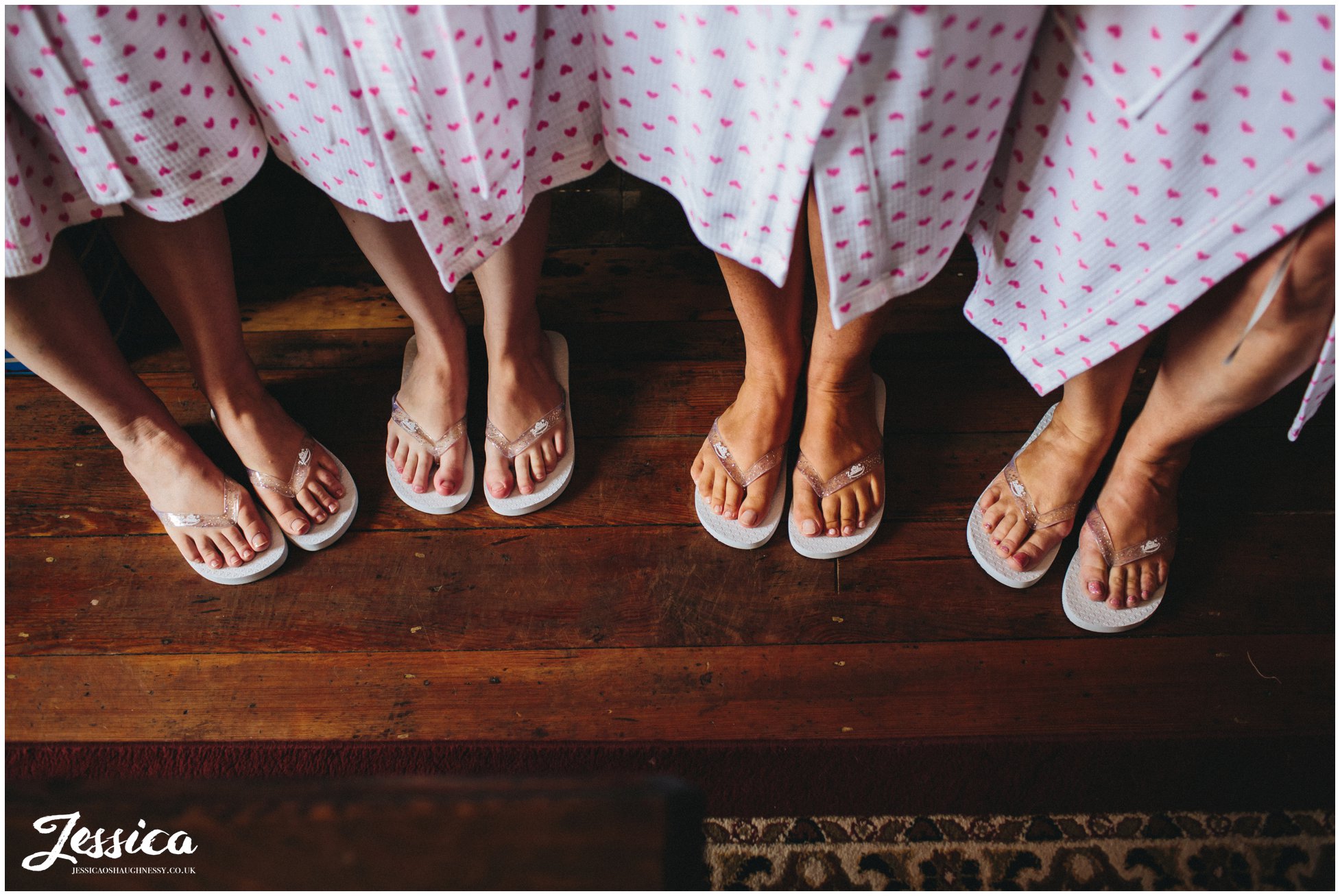 bridesmaids wearing their wedding day flip flops