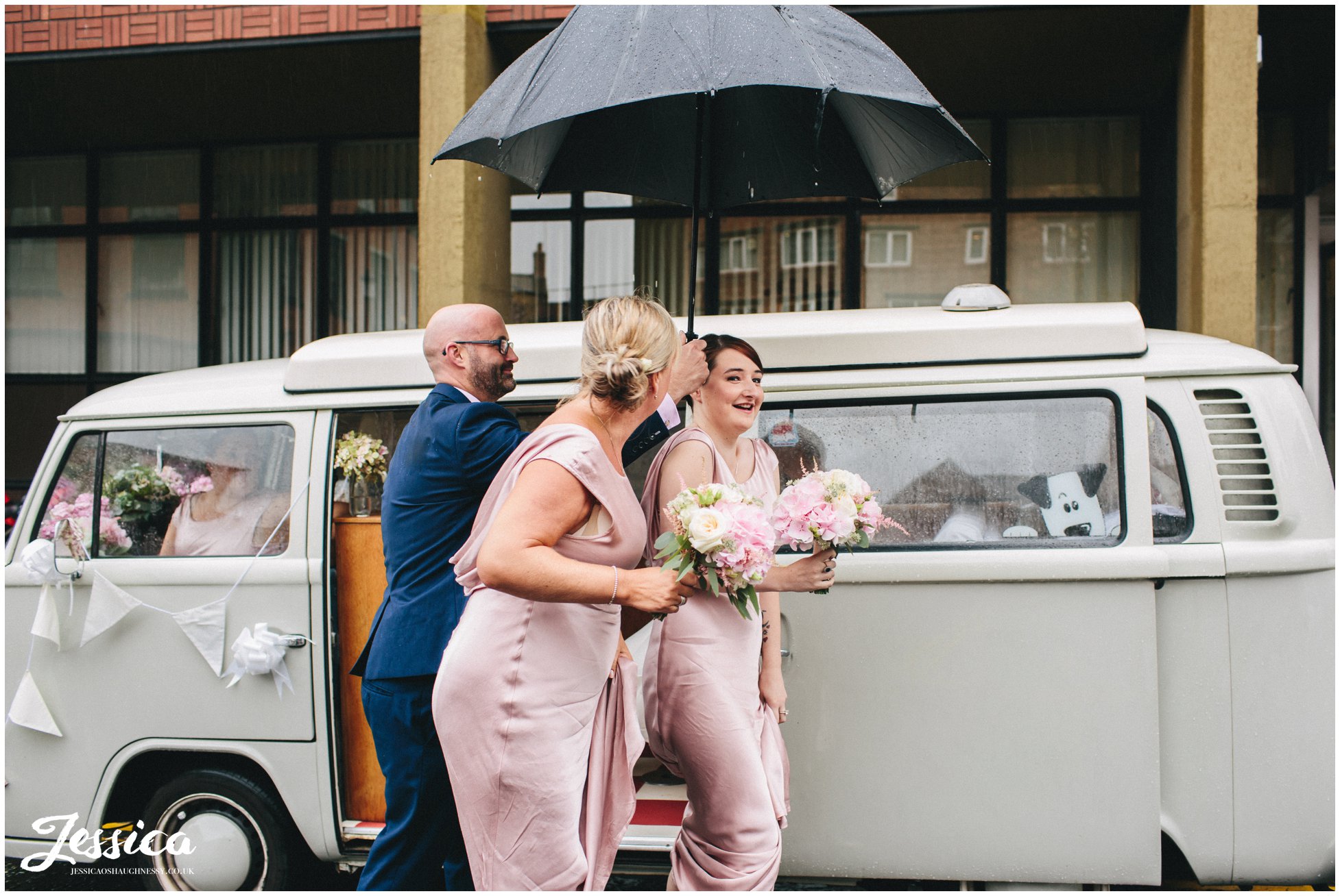 bridesmaids getting out of VW camper at Chester Registry Office