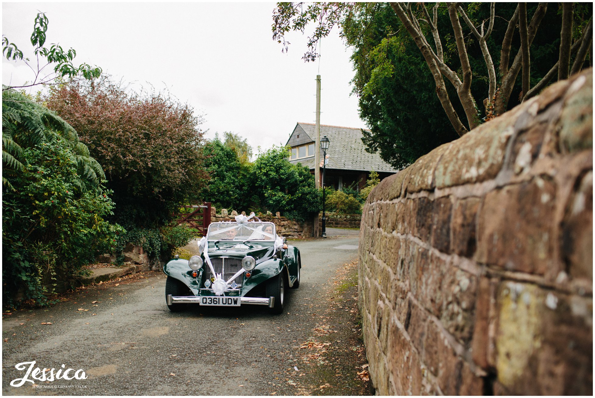 bride arrives at farndon church in a green kit car