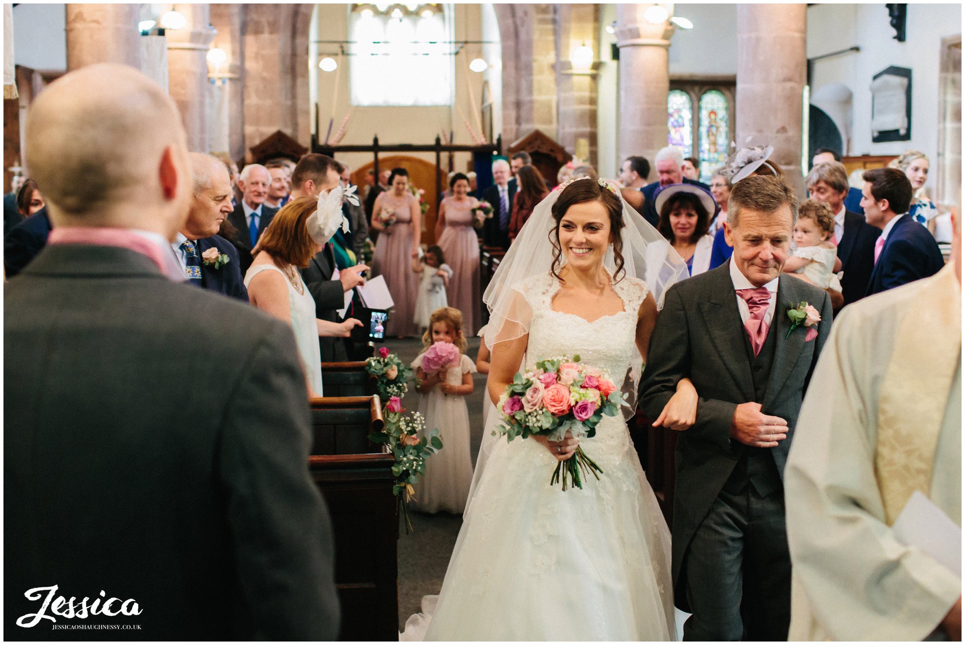 bride see's her groom for the first time on their wedding day in cheshire