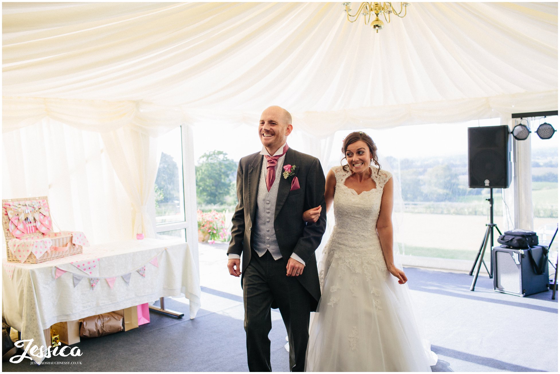 bride & groom are announced into their wedding breakfast at harthill weddings, cheshire