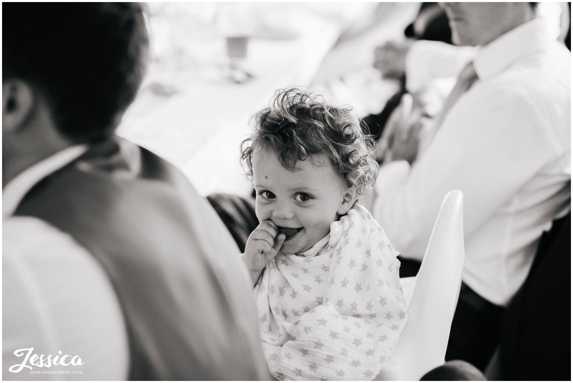 child laughing during the speeches at harthill weddings
