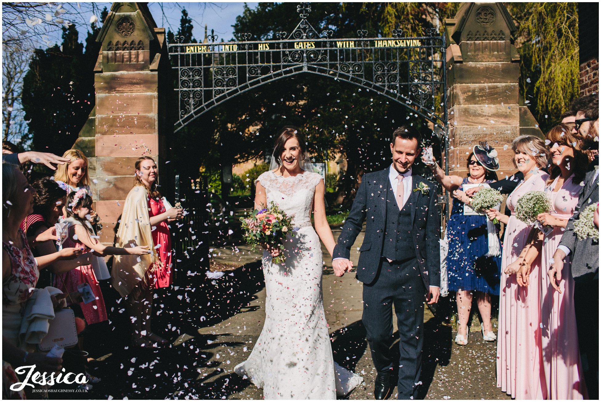 guests throw confetti and the bride and groom leave for their reception
