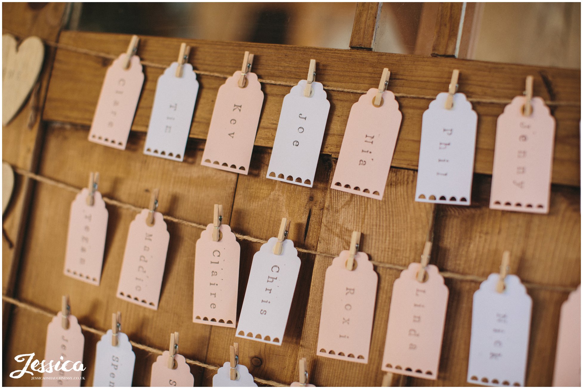 close up of rustic table plan at tower hill barns in north wales