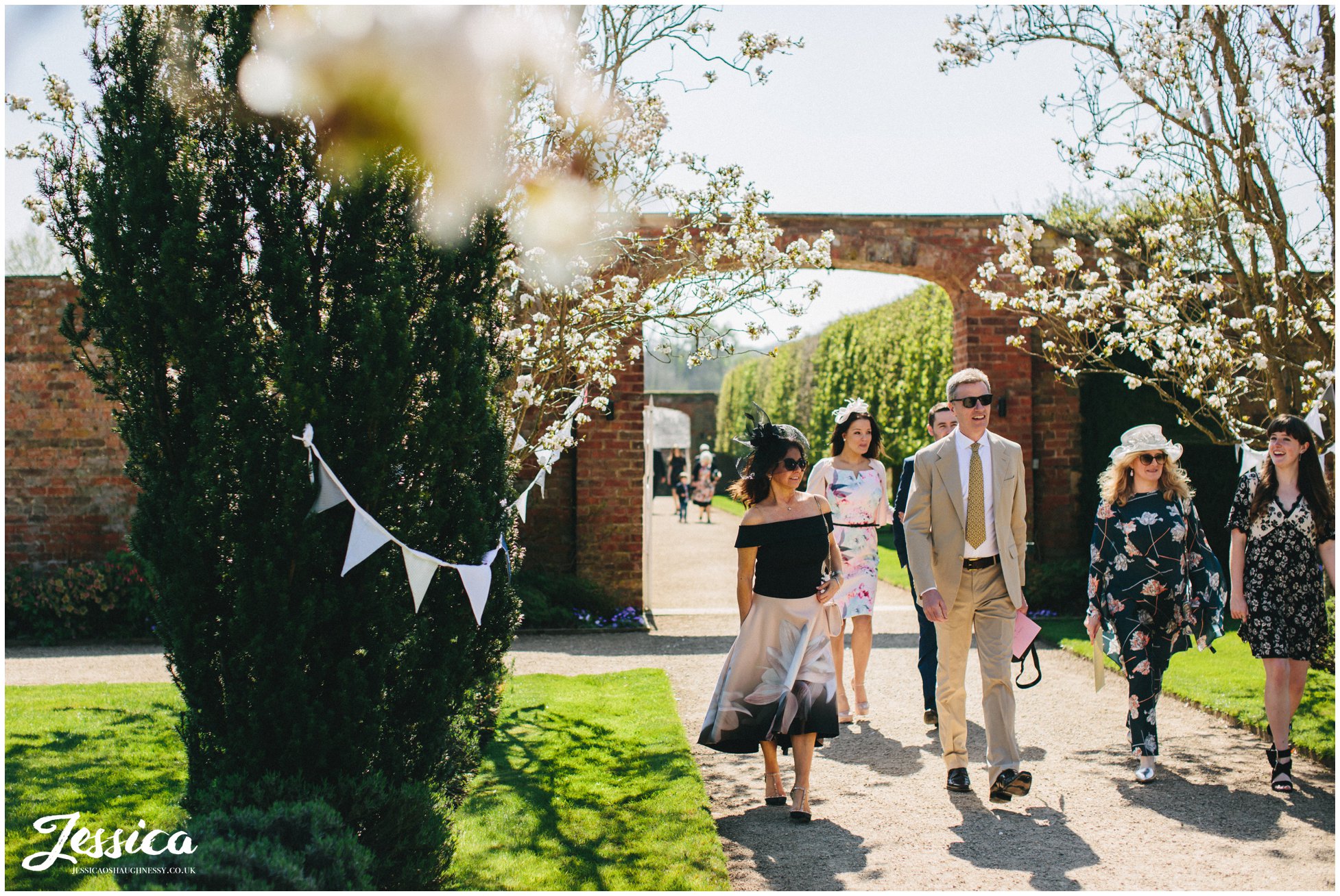 guests arriving at Combermere Abbey for the wedding ceremony