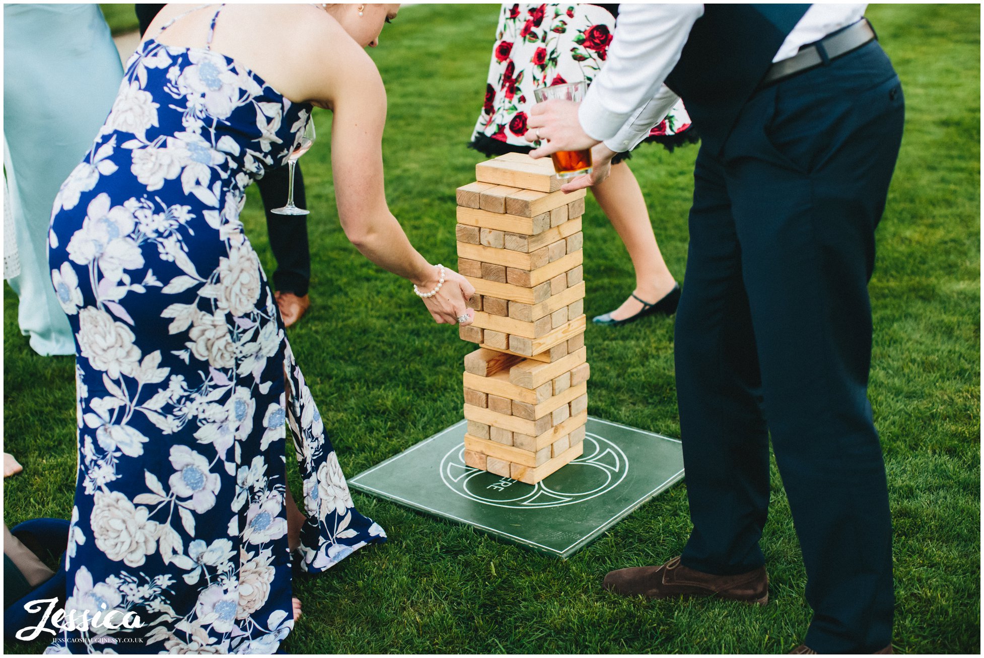 wedding guests play jenga at Combermere Abbey wedding