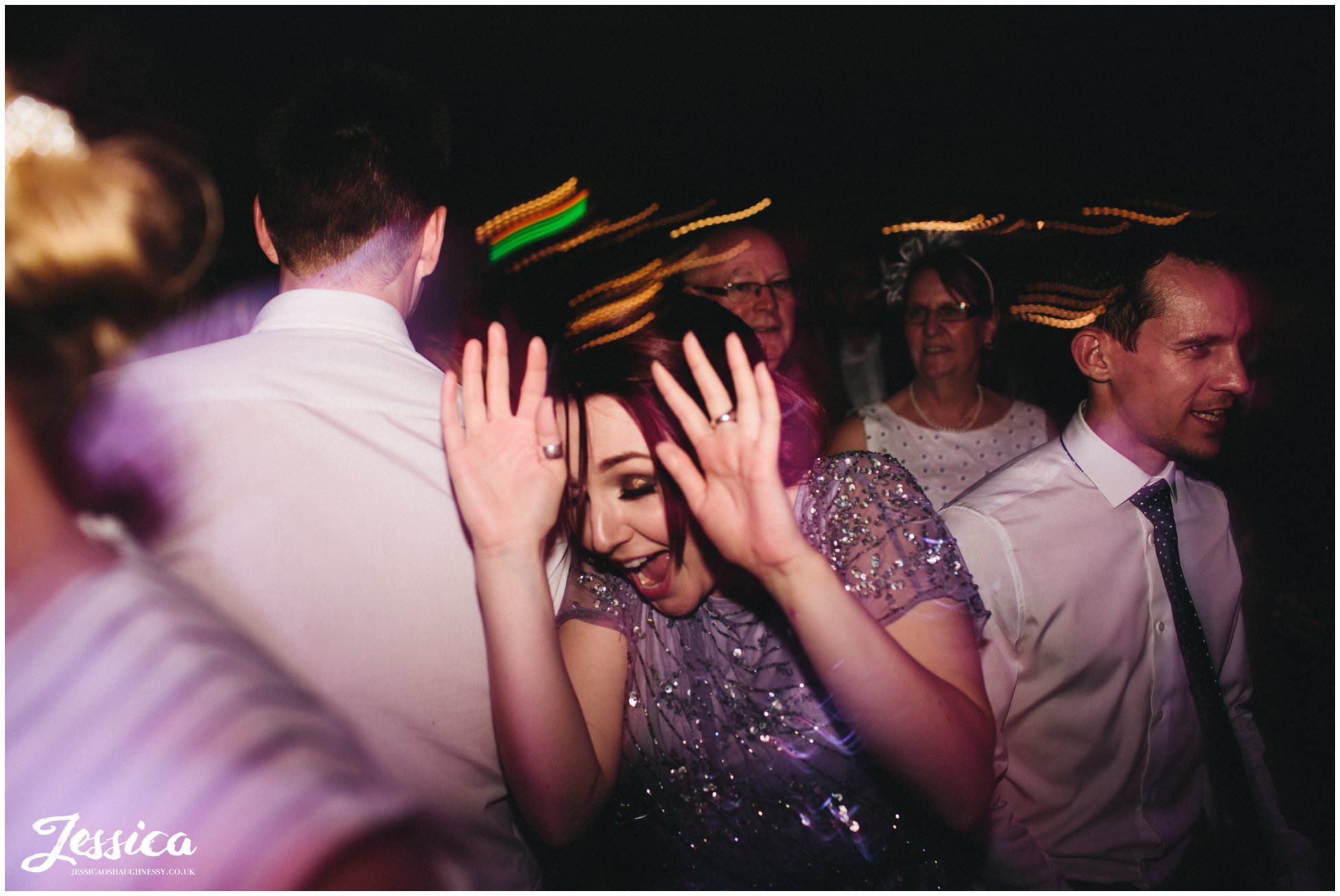 bridesmaid hides face from the camera
