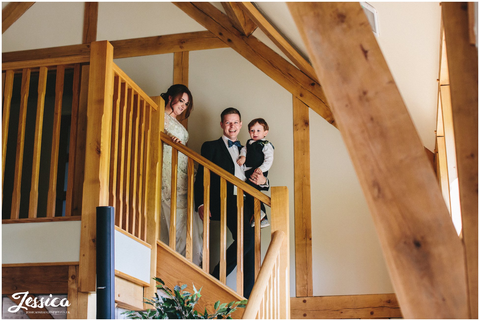 newly wed's & son are announced into their wedding breakfast