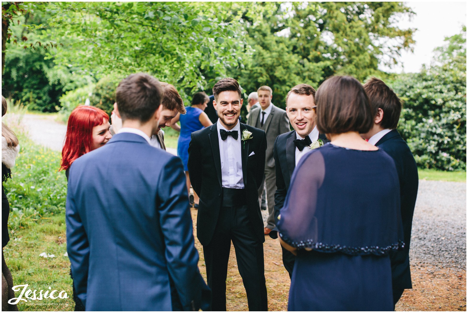 guests chatting outside trevor hall's church