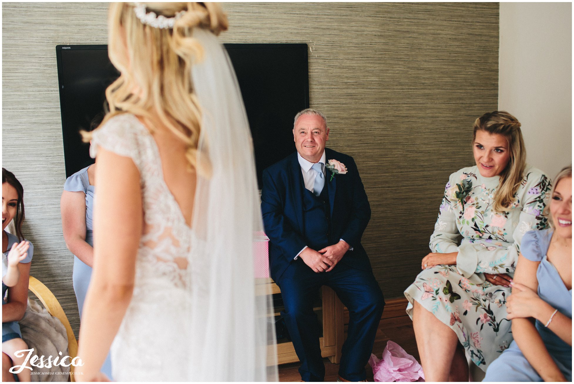 father of the bride see's daughter in her wedding dress for the first time - wirral wedding photography