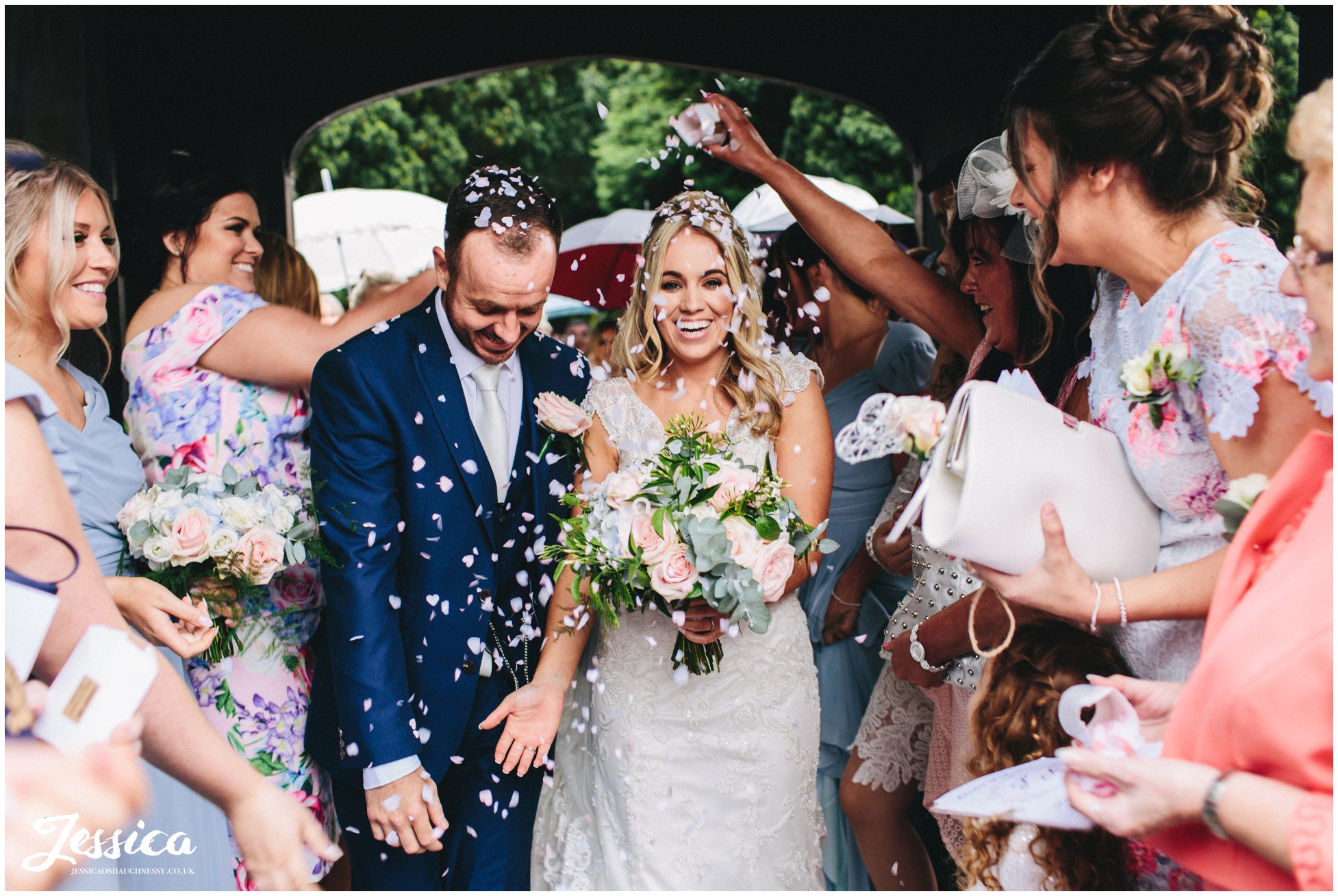 bride gets confetti poured on her head