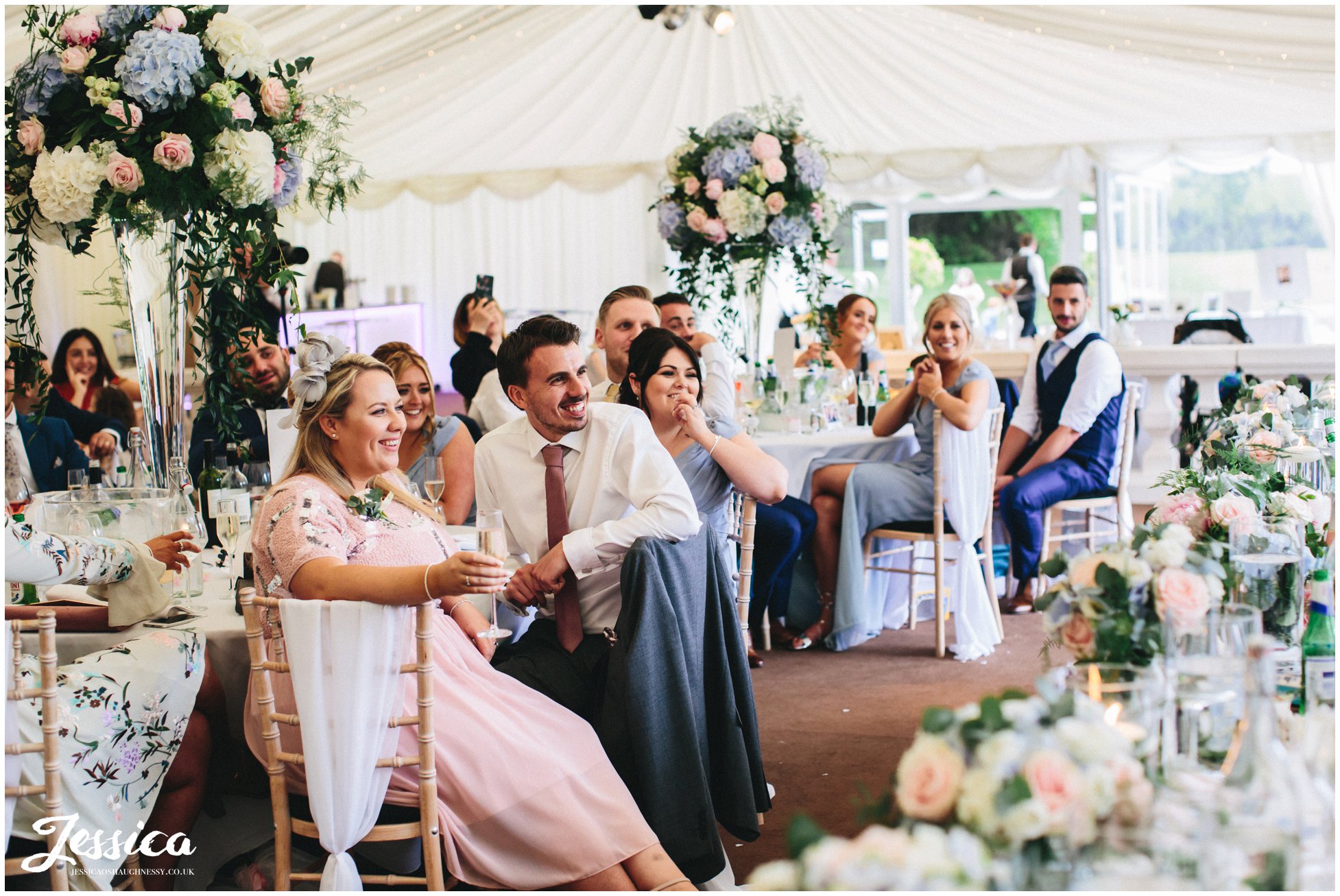 guests enjoying the speeches at a wirral wedding