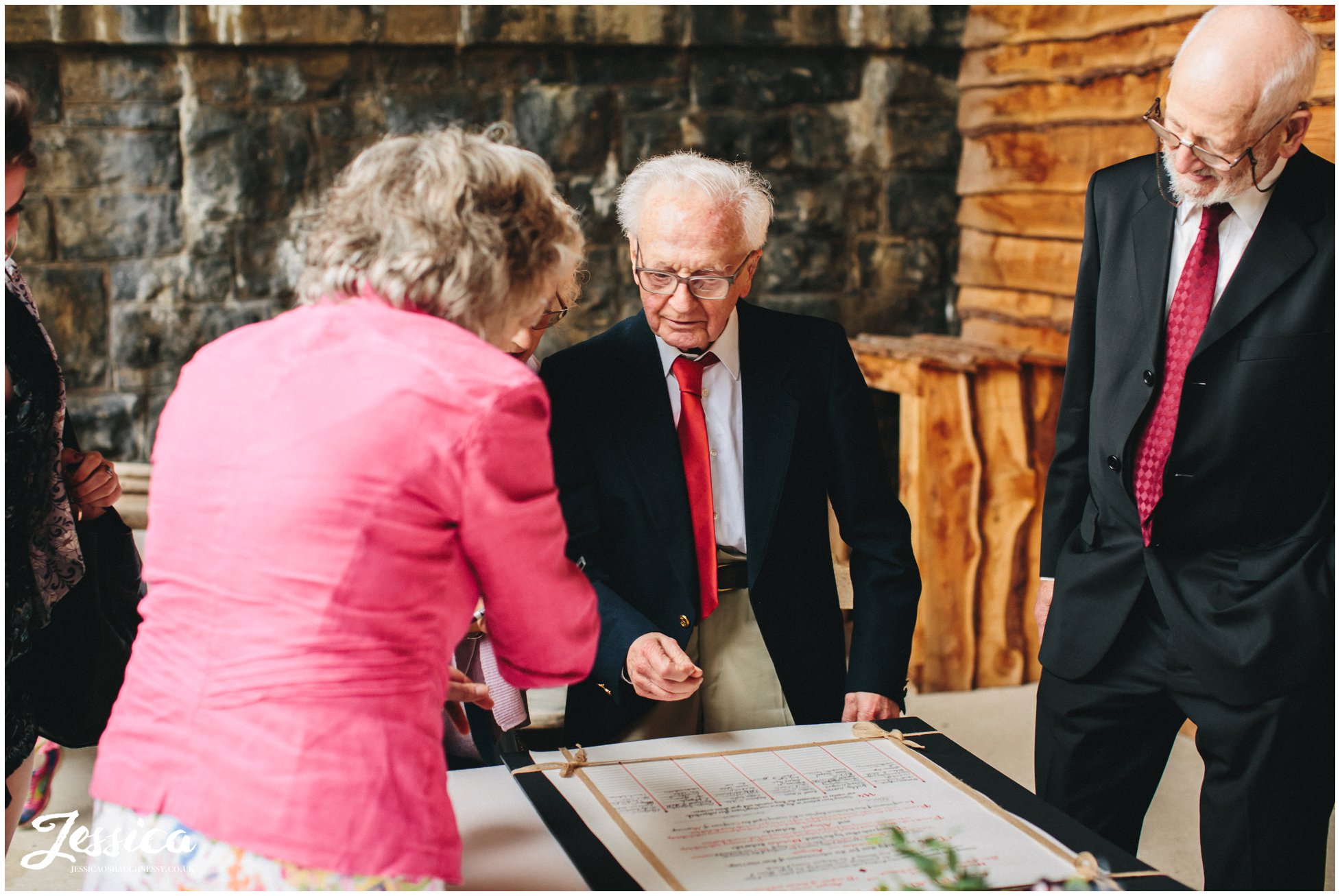 guests sign quaker wedding certificate - north wales wedding photographer