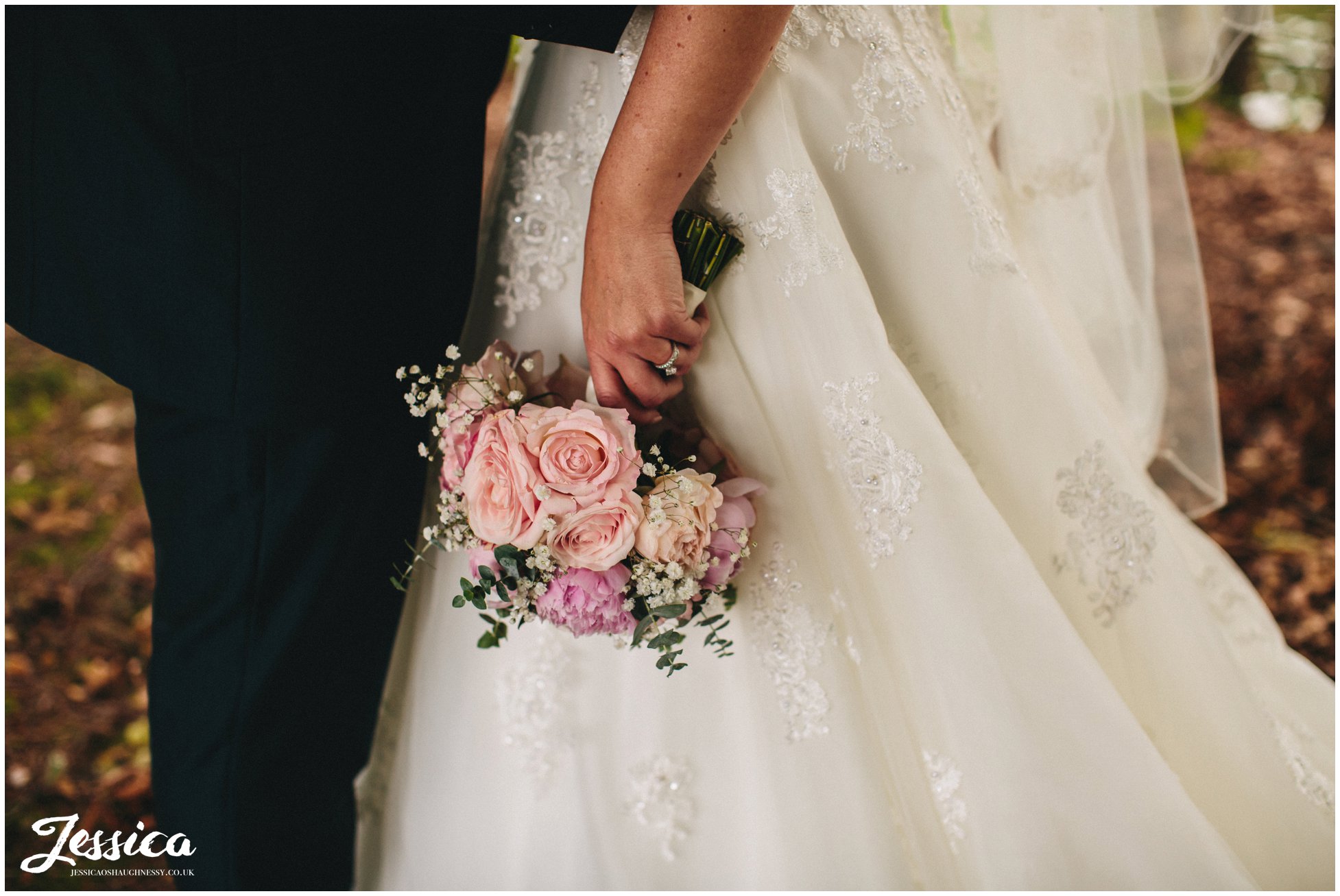 close up of bride holding bouquet - cheshire wedding photography