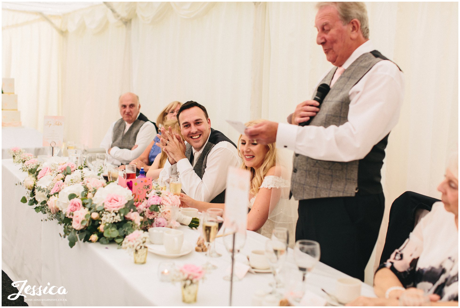 groom laughs during father of the bride speech