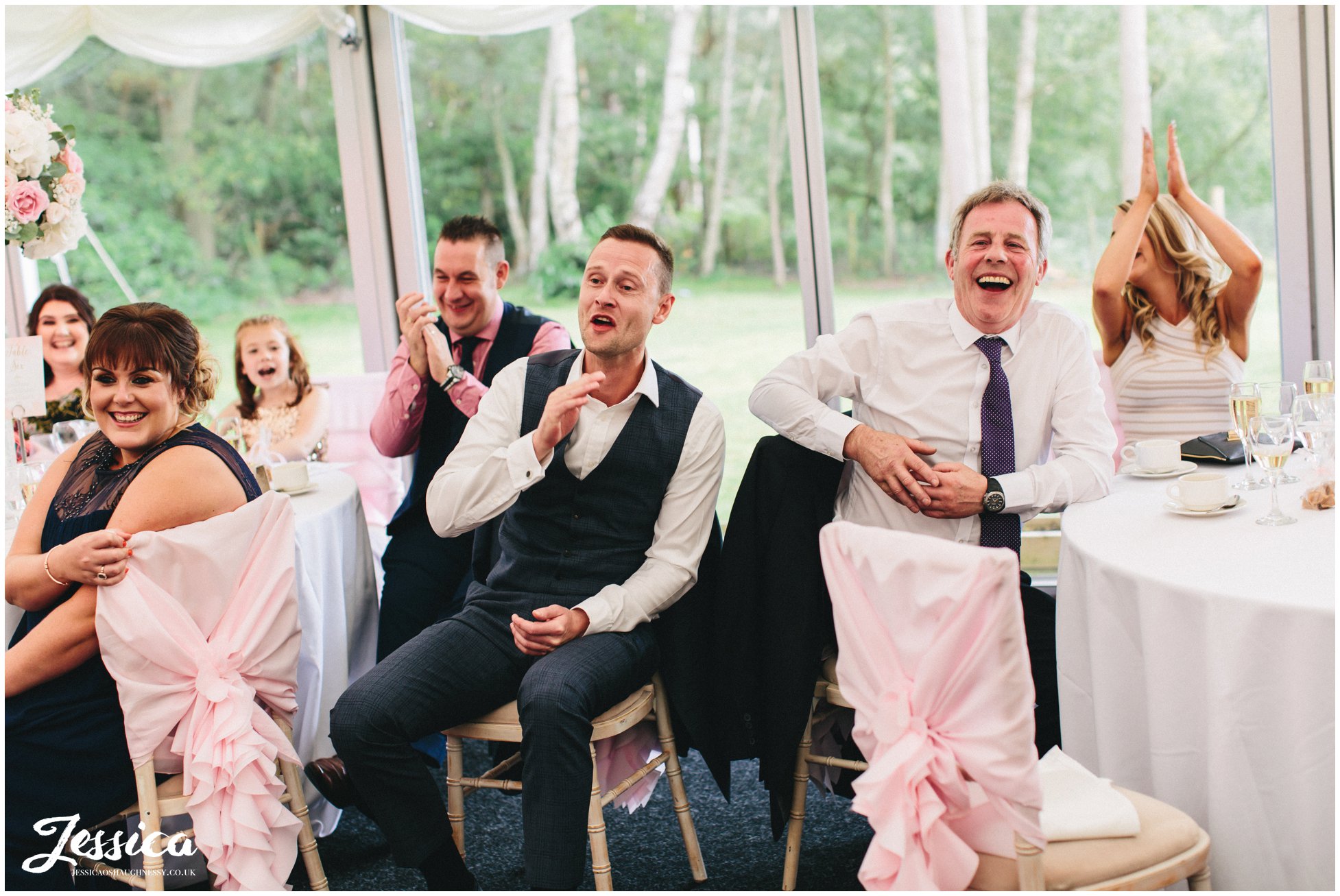cheshire wedding photography - guests applaud speeches